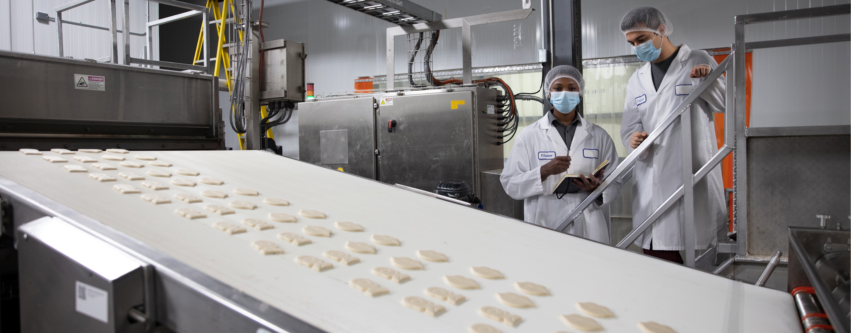 Isaac consultants monitoring a consumer product assembly line